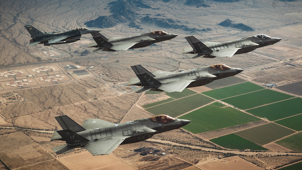 A U.S. Air Force F-16 Fighting Falcon aircraft assigned to the 309th Fighter Squadron and F-35A Lightning II’s assigned to the 61st Fighter Squadron, fly in formation, Jan. 19, 2024, over Luke Air Force Base, Arizona