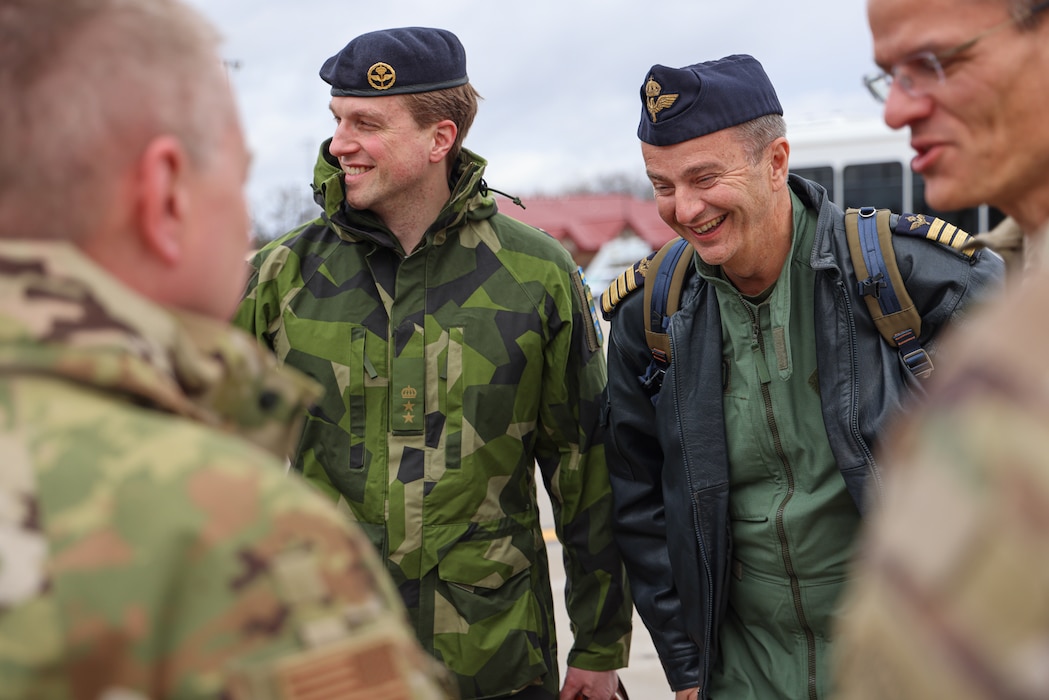 Col. Carl Bergqvist and Lt Col Peter Sturesson, Swedish Air Force, arrive at the Alpena Combat Readiness Training Center (CRTC,) Michigan, for an official visit on April 3rd, 2024. Michigan National Guard (MING) hosted members of Headquarters Air Force (HAF) and Swedish Air Force at the National All Domain Warfighting Center (NADWC) on April 3-4, 2024. The visit gave those attending a look at training venues and opportunities offered at the NADWC in Michigan. (U.S. Air National Guard photo by Tech. Sgt. Drew Schumann)