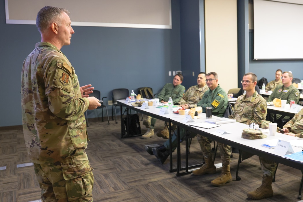 Col. David Spehar, Deputy Commander of the 127th Wing, Michigan Air National Guard, addresses visiting members from Headquarters Air Force (HAF) and Swedish Air Force during a visit to the National All Domain Warfighting Center (NADWC) on April 3rd, 2024. The Michigan National Guard (MING) hosted members of Headquarters Air Force and Swedish Air Force at the NADWC on April 3-4, 2024. The visit gave those attending a look at training venues and opportunities offered at the NADWC in Michigan. (U.S. Air National Guard photo by Tech. Sgt. Drew Schumann)