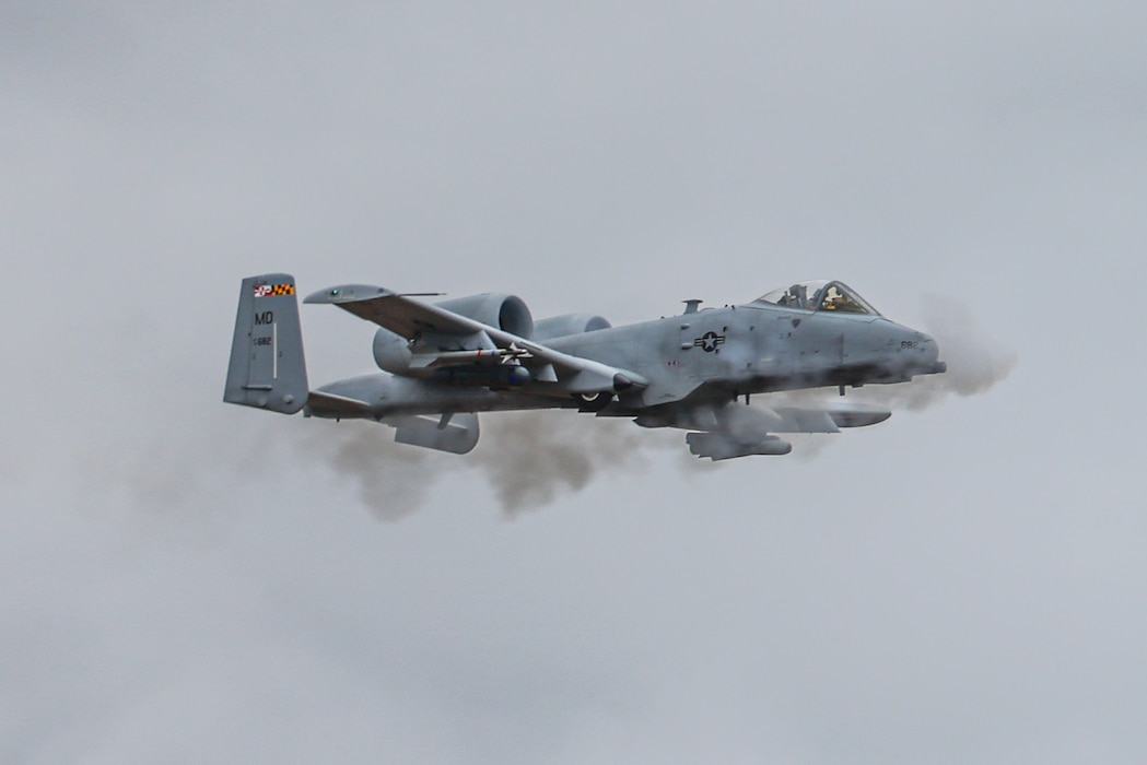 An A-10 Thunderbolt II from the 104th Fighter Squadron, Maryland Air National Guard, performs a Close Air Support (CAS) demonstration for a visiting delegation from Headquarters Air Force (HAF) and the Swedish Air Force, at the Grayling Air Gunnery Range in Chester Twp., Michigan on April 3rd, 2024. The Michigan National Guard (MING) hosted members of Headquarters Air Force and Swedish Air Force at the National All Domain Warfighting Center (NADWC) on April 3-4, 2024. The visit gave those attending a look at training venues and opportunities offered at the NADWC in Michigan. (U.S. Air National Guard photo by Tech. Sgt. Drew Schumann)