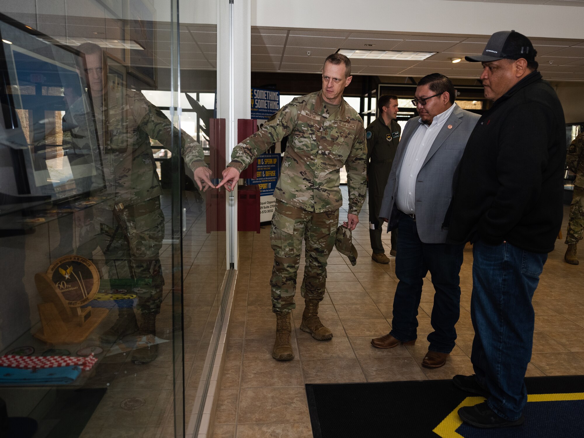 U.S. Air Force Chief Master Sgt. Jeffrey Martin, 49th Wing command chief, highlights 49th Wing history to members of the Mescalero Apache Tribe at Holloman Air Force Base, New Mexico, April 1, 2024.