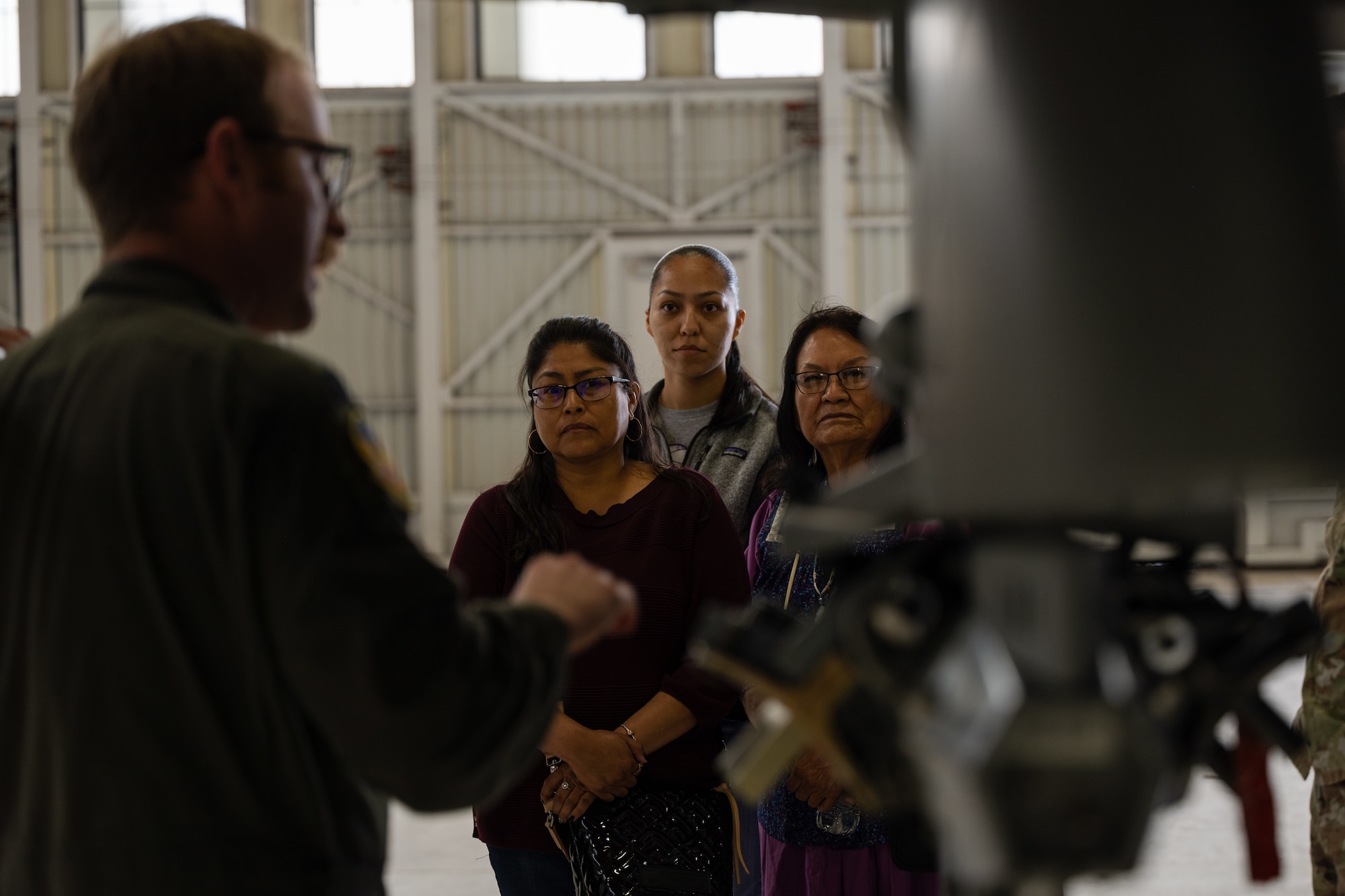 U.S. Air Force Capt. Nathaniel Dickman, 8th Fighter Squadron F-16 Viper instructor pilot, showcases F-16 Viper weapons systems to members of the Mescalero Apache Tribe at Holloman Air Force Base, New Mexico, April 1, 2024.