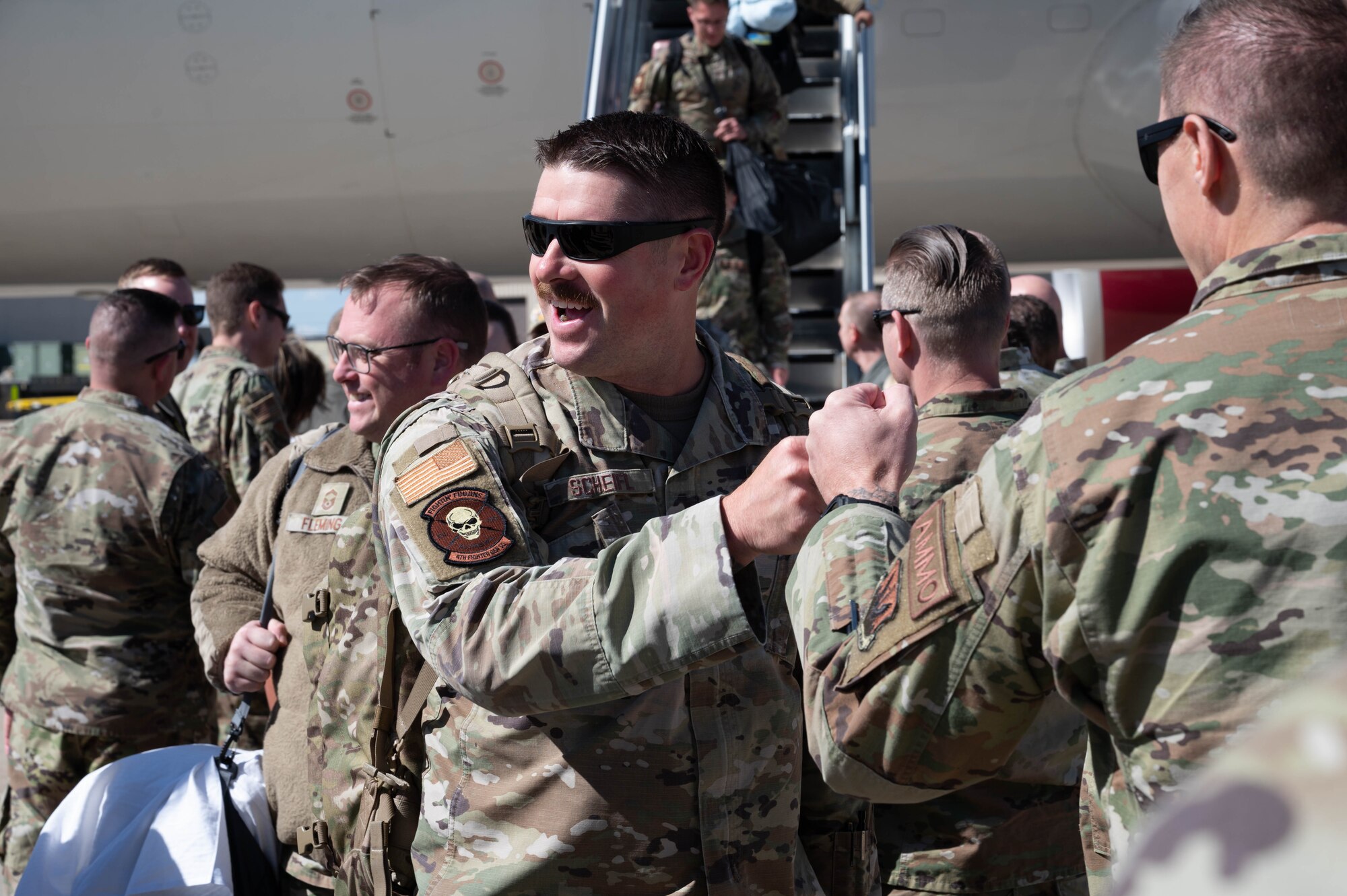 A photo of Airmen returning from deployment