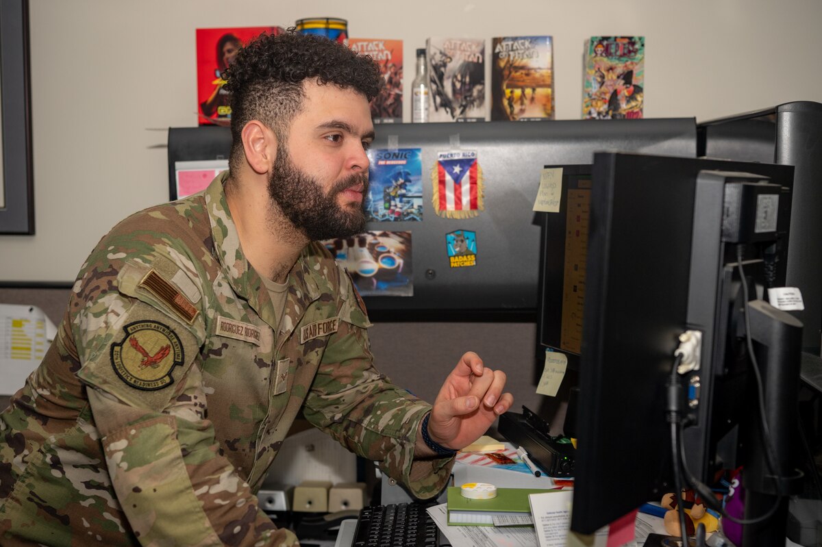 U.S. Air Force Airman 1st Class Hector Rodriguez Rodriguez, 20th Logistics Readiness Squadron logistics planner, reviews a document at Shaw Air Force Base, S.C., March 14, 2024. Coordinating massive aviation movements requires plans from multiple units, and seamlessly executing this task requires attention to detail ensuring all mission requirements are accounted for. (U.S. Air Force photo by Airman 1st Class Kyrii Richardson)