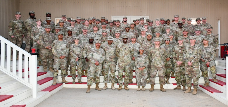 U.S. Army Soldiers standing in a group for a photo.