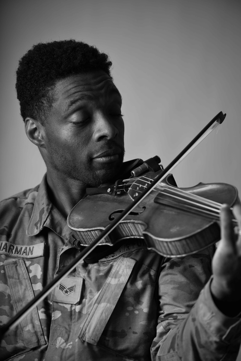 U.S. Air Force Senior Airman Joshua Harman, 95th Reconnaissance Squadron avionics journeyman, plays the violin at Royal Air Force Mildenhall, England, April 3, 2024. Harman is the first HOPE specialist at the 95th RS. The HOPE spiritual fitness initiative is a community program that fosters connection among Airmen by promoting resilience, volunteering, morale, leadership, and spiritual growth inclusive to all religious beliefs. (U.S. Air Force photo by Senior Airman Viviam Chiu)