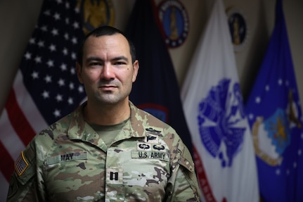 U.S. Army Capt. Greg May of the Guam National Guard displays his recently earned Pathfinder Badge at Joint Force Headquarters Guam April 2, 2024. May volunteered for Pathfinder School with two days' notice and, despite a series of retests, beat the odds and earned the honorary title of "Blade Runner."