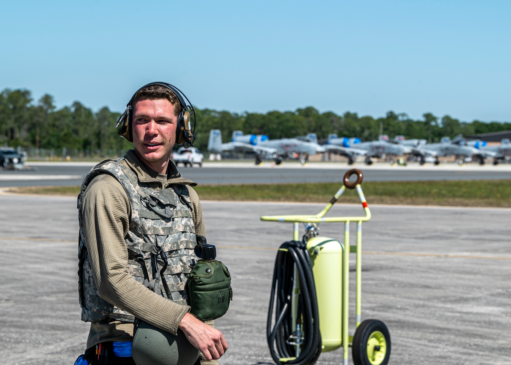 U.S. Air Force Airman 1st Class William Skinner, 74th Fighter Generation Squadron crew chief, prepares to launch an A-10C Thunderbolt II during Exercise Ready Tiger 24-1 at Avon Park Air Force Range, Florida, April 12, 2024. Crew chiefs perform maintenance and work hand-in-hand with pilots to ensure the Air Force is ready to project power anytime, anywhere. Ready Tiger 24-1 is a readiness exercise demonstrating the 23rd Wing’s ability to plan, prepare and execute operations and maintenance to project air power in contested and dispersed locations, defending the United States’ interests and allies. (U.S. Air Force photo by Airman 1st Class Leonid Soubbotine)