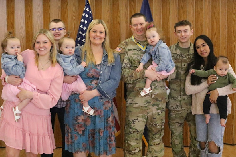 Master Sgt. Nicholas Brinckman (center) and family pose for a photo following his retirement ceremony at Fort Indiantown Gap, Pa. April 8, 2024. (U.S. Army National Guard photo by Sgt. 1st Class Shane Smith)