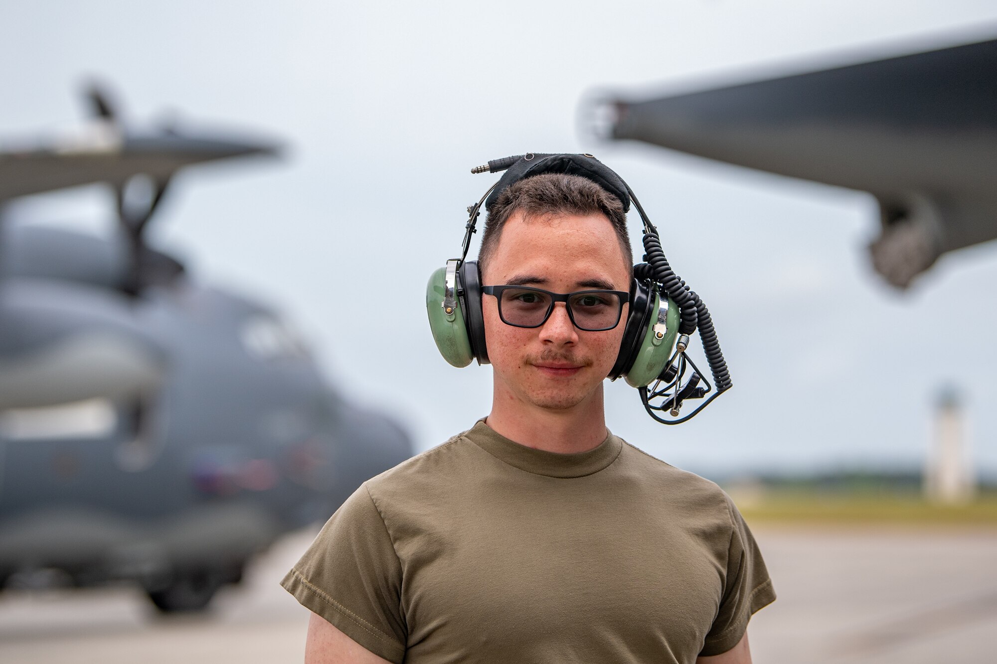 U.S. Air Force Airman 1st Class Kai Pfeiff, 71st Rescue Generation Squadron avionics craftsman, poses for a photo during Exercise Ready Tiger 24-1 at Savannah Air National Guard Base, Georgia, April 10, 2024. During Ready Tiger 24-1, the 23rd Wing will be evaluated on the integration of Air Force Force Generation principles such as Agile Combat Employment, integrated combat turns, forward aerial refueling points, multi-capable Airmen, and combat search and rescue capabilities. (U.S. Air Force photo by Senior Airman Courtney Sebastianelli)
