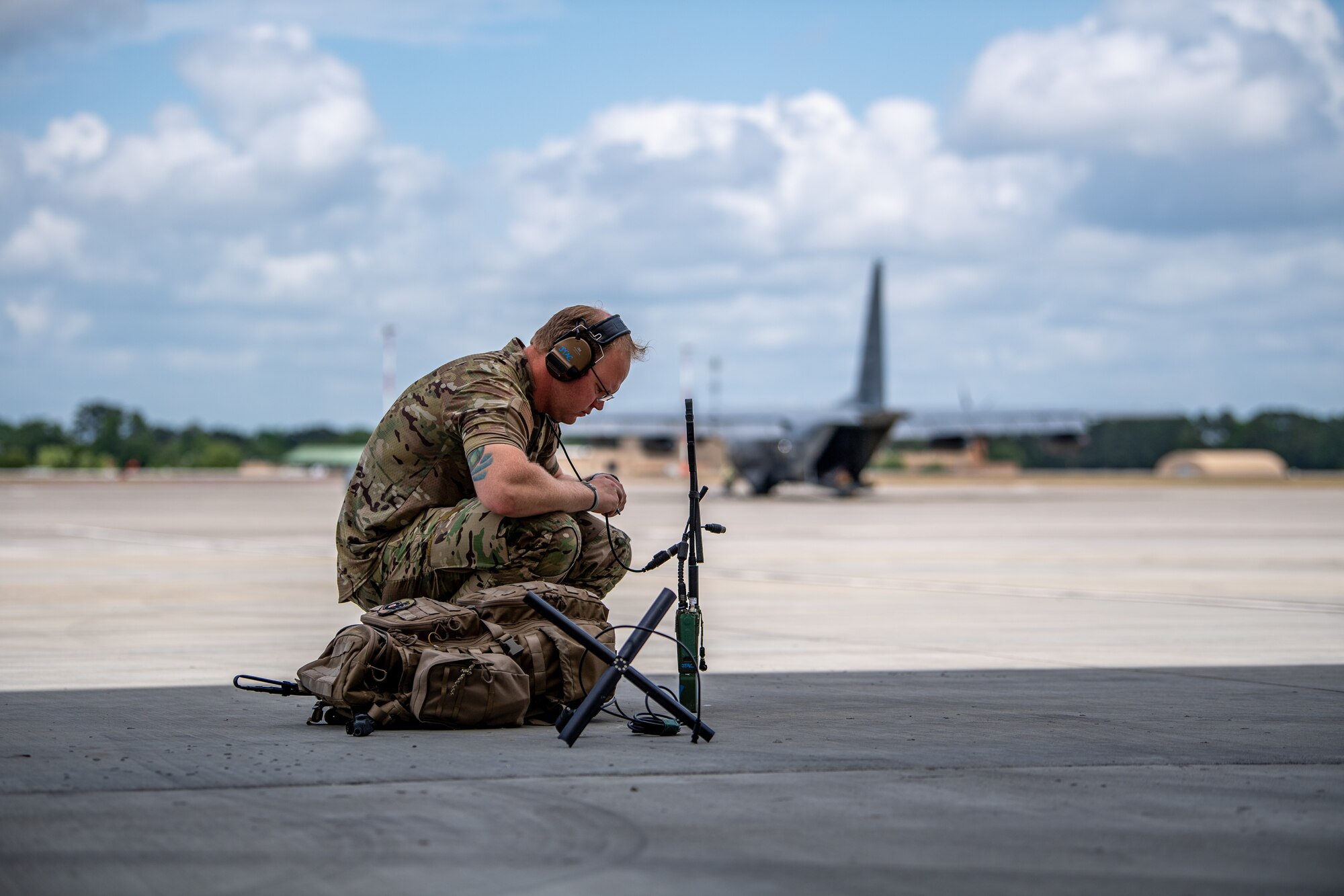 A U.S. Air Force Airman assigned to the 38th Rescue Squadron sets up a satellite communication radio antenna during Exercise Ready Tiger 24-1 at Savannah Air National Guard Base, Georgia, April 10, 2024. During Ready Tiger 24-1, the 23rd Wing will be evaluated on the integration of Air Force Force Generation principles such as Agile Combat Employment, integrated combat turns, forward aerial refueling points, multi-capable Airmen, and combat search and rescue capabilities. (U.S. Air Force photo by Senior Airman Courtney Sebastianelli)
