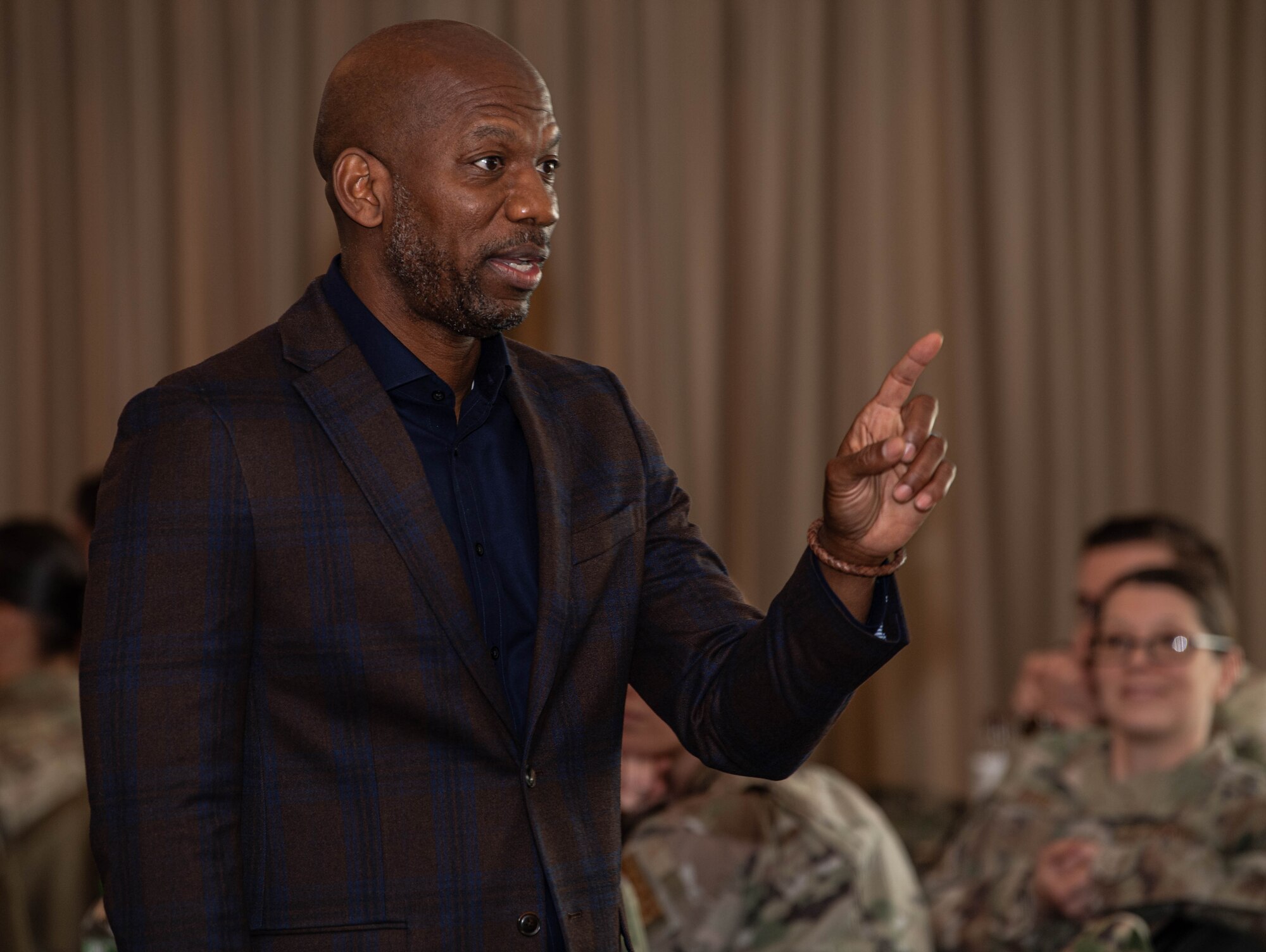 Retired U.S. Air Force Chief Master Sgt. Todd Simmons, founder of Courageous Leaders Alliance, speaks during a first sergeant symposium at Ramstein Air Base, Germany, April 2, 2024. The aim of the first sergeant symposium was to enhance the professional development of first sergeants across U.S. Air Forces in Europe and Air Forces Africa, equipping them with essential tools and strategies to better serve their units. (U.S. Air Force photo by Senior Airman Jared Lovett)