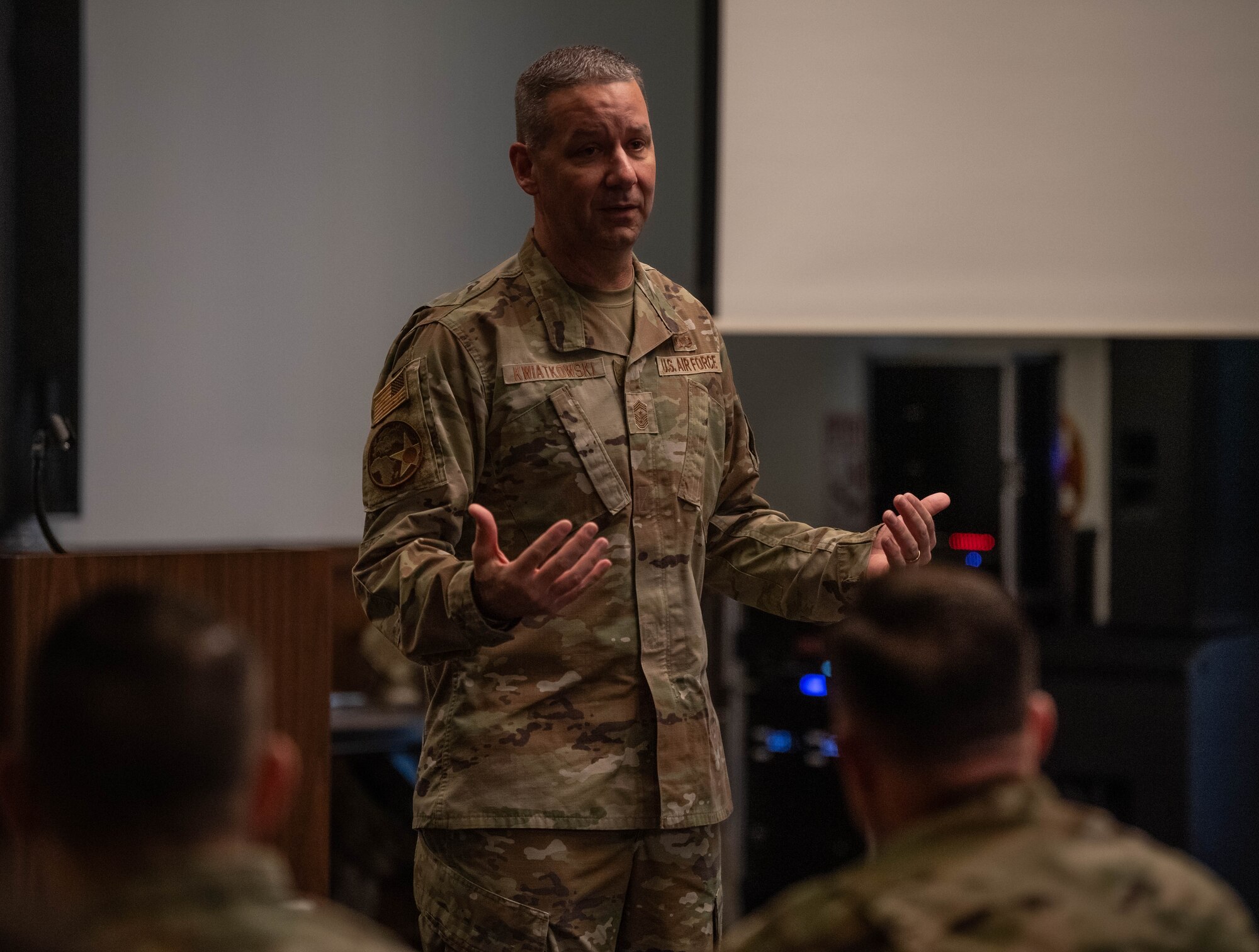 U.S. Air Force Chief Master Sgt. Randy Kwiatkowski, USAFE-AFAFRICA command chief, speaks during a first sergeant symposium at Ramstein Air Base, Germany, April 3, 2024. The symposium provided attendees with comprehensive training and guidance to excel in their roles as first sergeants. (U.S. Air Force photo by Senior Airman Jared Lovett)