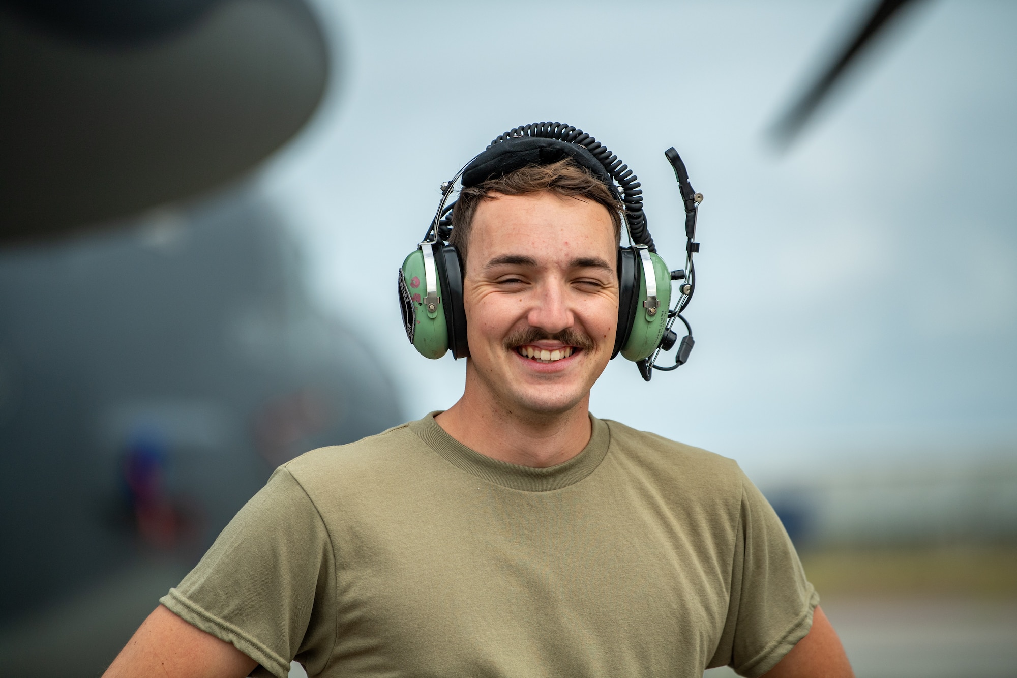 U.S. Air Force Senior Airman Zachary Haverlah, 71st Rescue Generation Squadron crew chief, poses for a photo during Exercise Ready Tiger 24-1 at Savannah Air National Guard Base, Georgia, April 10, 2024. During Ready Tiger 24-1, the 23rd Wing will be evaluated on the integration of Air Force Force Generation principles such as Agile Combat Employment, integrated combat turns, forward aerial refueling points, multi-capable Airmen, and combat search and rescue capabilities. (U.S. Air Force photo by Senior Airman Courtney Sebastianelli)