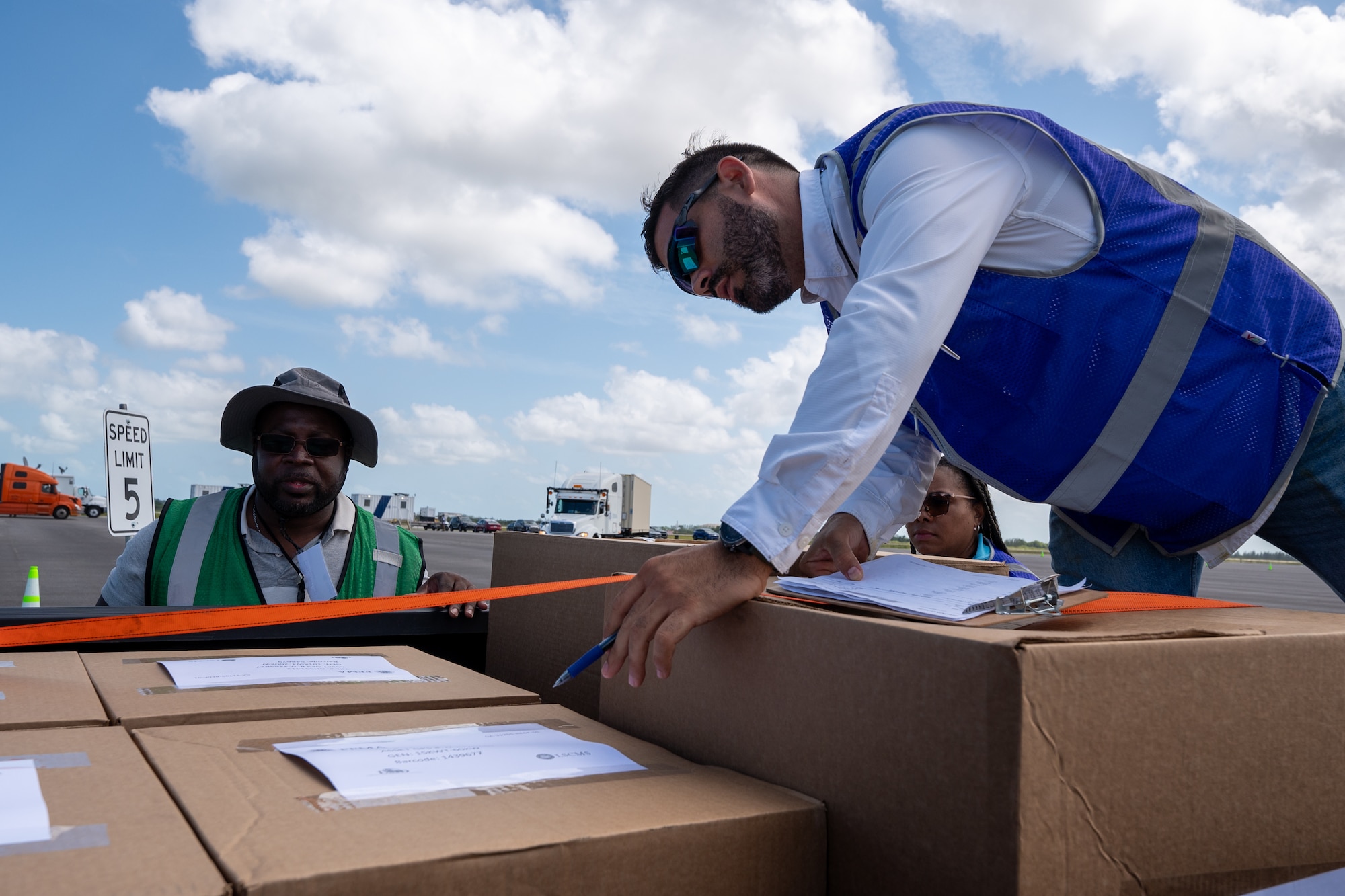 FEMA personnel lead a logistics exercise featuring emergency scenarios with semi-trucks at the Eagle Raising 3.0 event, supported by Air Force Emergency Management, at Homestead Air Reserve Base, Florida, on April 10, 2024.