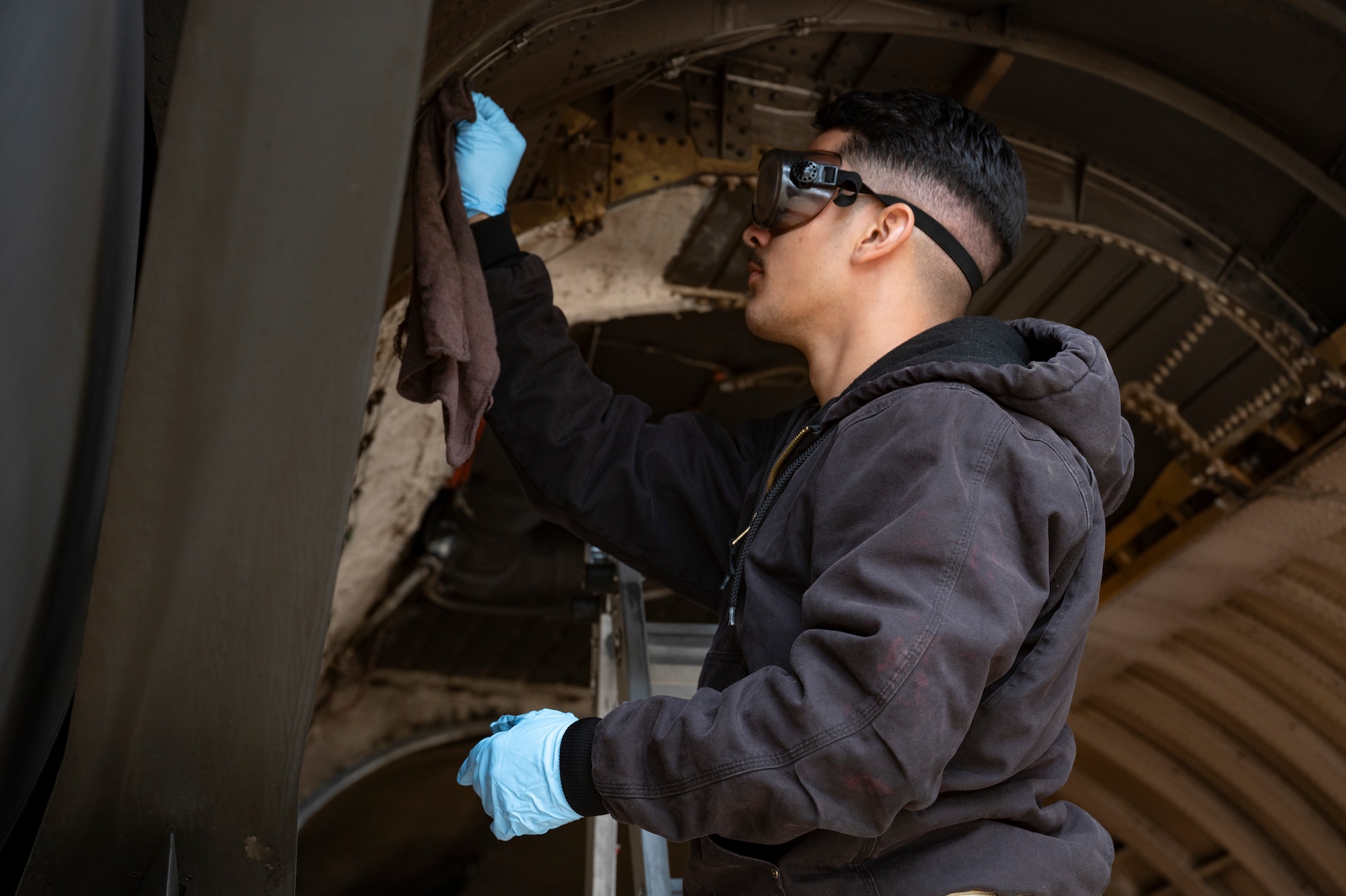 U.S. Air Force Senior Airman Brandon Vazquez-Flores, 9th Expeditionary Bomb Squadron electrical and environmental specialist, completes an engine swap on a B-1B Lancer at Morón Air Base, Spain, April 3, 2024, during Bomber Task Force Europe. BTF 24-2 demonstrates that NATO Allies and partner nations can seamlessly operate together to maintain a stable and prosperous Euro-Atlantic region. (U.S. Air Force photo by Airman 1st Class Emma Anderson)