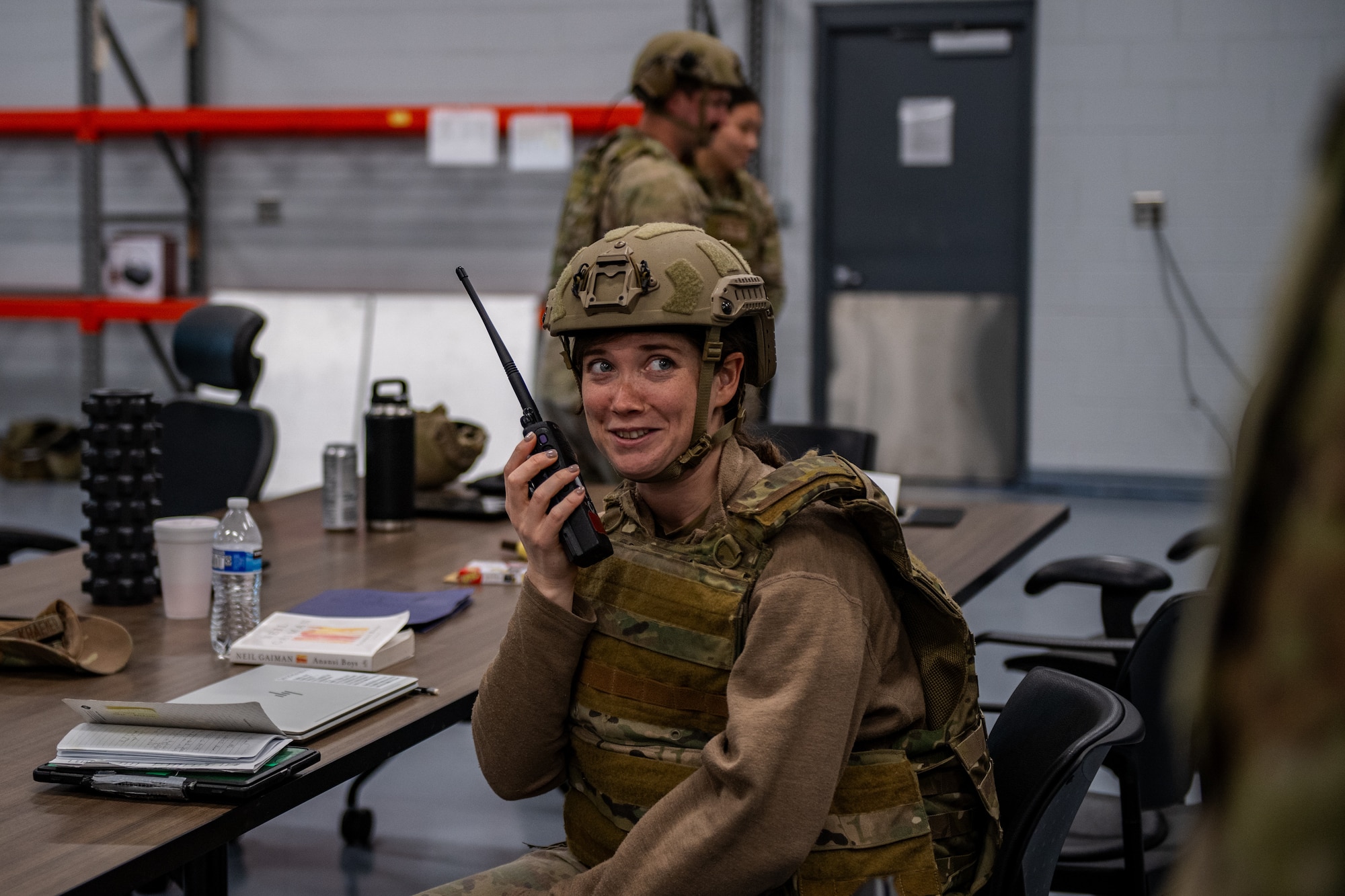U.S. Air Force Capt. Francis Graff, 71st Rescue Squadron combat systems officer, listens to a radio call from the forward operating site during Exercise Ready Tiger 24-1 at Savannah Air National Guard Base Georgia April 12, 2024. During Ready Tiger 24-1, exercise inspectors will assess the 23rd Wing's proficiency in employing decentralized command and control to fulfill air tasking orders across geographically dispersed areas amid communication challenges, integrating Agile Combat Employment principles such as integrated combat turns, forward aerial refueling points, multi-capable Airmen, and combat search and rescue capabilities. (U.S. Air Force photo by Senior Airman Courtney Sebastianelli)