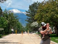 “My wife and child are why I continue pushing so hard. I love to hear him yell GO DADDY!” – Michael Stephens, with his son Weslan at the Olympic training center in Colorado.
