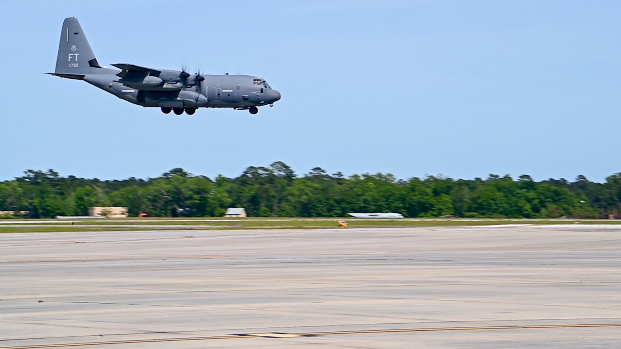 U.S. Air Force Airmen assigned to the 71st Rescue Squadron prepare to land an HC-130J Combat King II during Exercise Ready Tiger 24-1 at Moody Air Force Base, Georgia, April 8, 2024. The 71st RQS is responsible for the transportation of cargo and Moody personnel throughout Exercise Ready Tiger. Ready Tiger 24-1 is a readiness exercise demonstrating the 23rd Wing’s ability to plan, prepare and execute operations and maintenance to project air power in contested and dispersed locations, defending the United States’ interests and allies. (U.S. Air Force photo by 2nd Lt. Benjamin Williams)