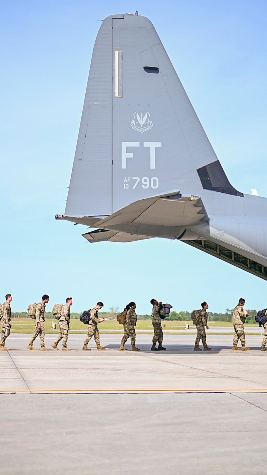 U.S Air Force Airmen from the 23rd Wing prepare to board an HC-130J Combat King II during Exercise Ready Tiger 24-1 at Moody Air Force Base, Georgia, April 8, 2024. Airmen from the 23rd Wing are organized, trained, and equipped to deploy to contingency locations across the world and execute their duties in full. Built upon Air Combat Command's directive to assert air power in contested environments, Exercise Ready Tiger 24-1 aims to test and enhance the 23rd Wing’s proficiency in executing Lead Wing and Expeditionary Air Base concepts through Agile Combat Employment and command and control operations. (U.S. Air Force photo by 2nd Lt. Benjamin Williams)
