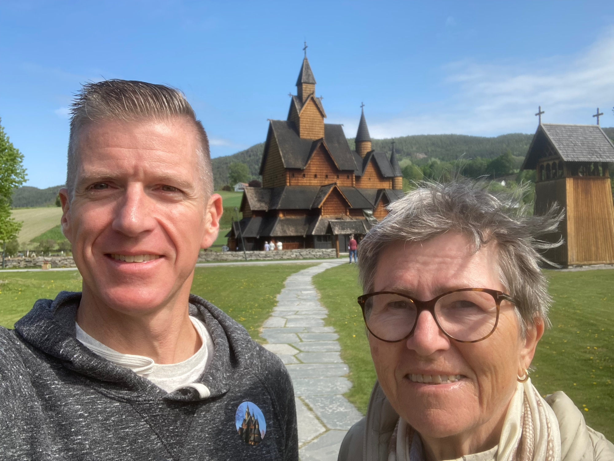 LEAP Scholar and his tutor standing in front of a church in Norway.