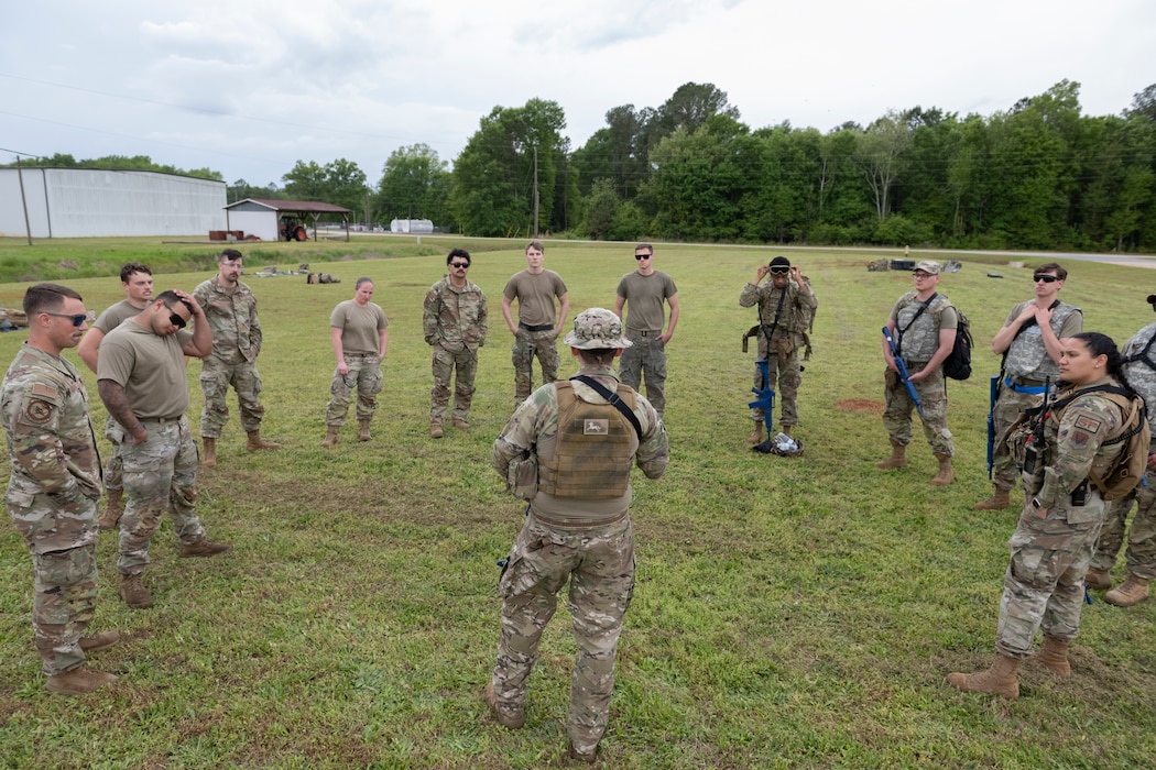 U.S. Air Force Master Sgt. David Peters, 74th Fighter Generation Squadron first sergeant, gives a brief at Perry-Houston County Airport, Georgia, April 10, 2024. Peters provided ground rules for accountability, working hours and flightline operations at the contingency location as part of Exercise Ready Tiger 24-1. During Ready Tiger 24-1, the 23rd Wing will be evaluated on the integration of Air Force Force Generation principles such as Agile Combat Employment, integrated combat turns, forward aerial refueling points, multi-capable Airmen, and combat search and rescue capabilities. (U.S. Air Force photo by Senior Airman Rachel Coates)