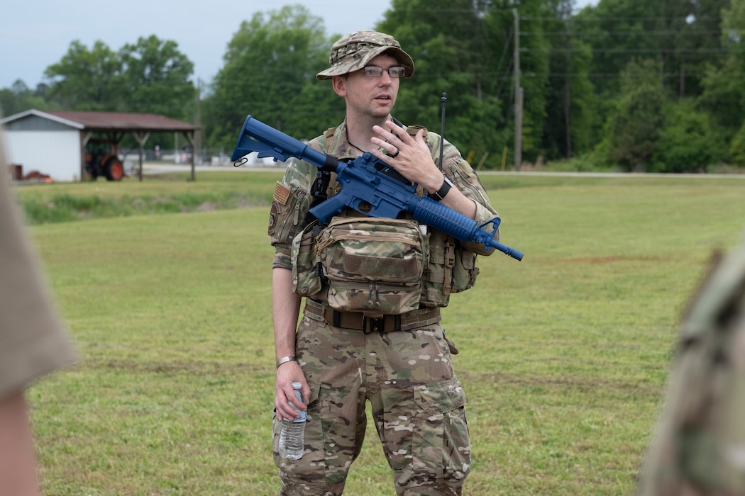 U.S. Air Force Master Sgt. David Peters, 74th Fighter Generation Squadron first sergeant, gives a brief at Perry-Houston County Airport, Georgia, April 10, 2024. Peters acted as the contingency location commander for Exercise Ready Tiger 24-1. During Ready Tiger 24-1, the 23rd Wing will be evaluated on the integration of Air Force Force Generation principles such as Agile Combat Employment, integrated combat turns, forward aerial refueling points, multi-capable Airmen, and combat search and rescue capabilities. (U.S. Air Force photo by Senior Airman Rachel Coates)