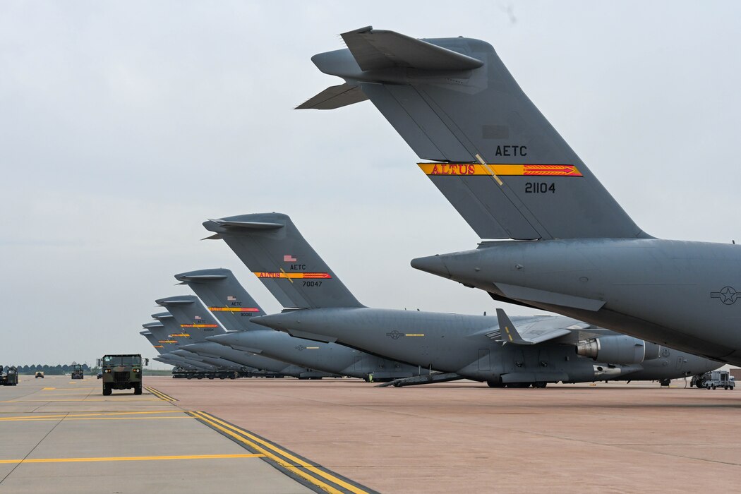 C-17 Globemaster III’s from the 58th Airlift Squadron (AS) sit on the flightline at Altus Air Force Base, Oklahoma, April 15, 2024. During the weather evacuation, the 58th AS was able to conduct student training, continuing the mission of “training exceptional mobility Airmen,” even during inclement weather. (U.S. Air Force photo by Senior Airman Trenton Jancze)