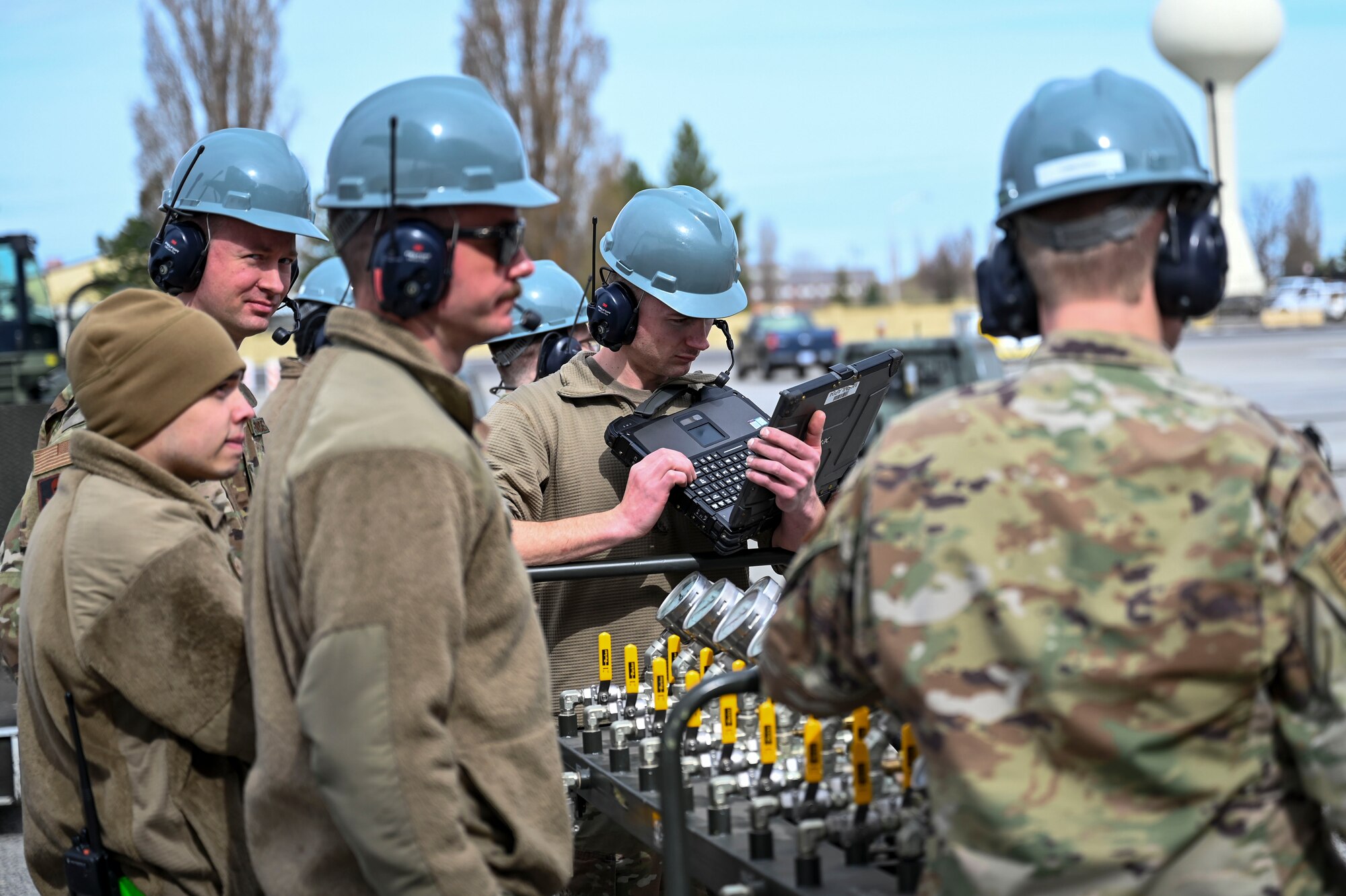 Airmen operate bag lift