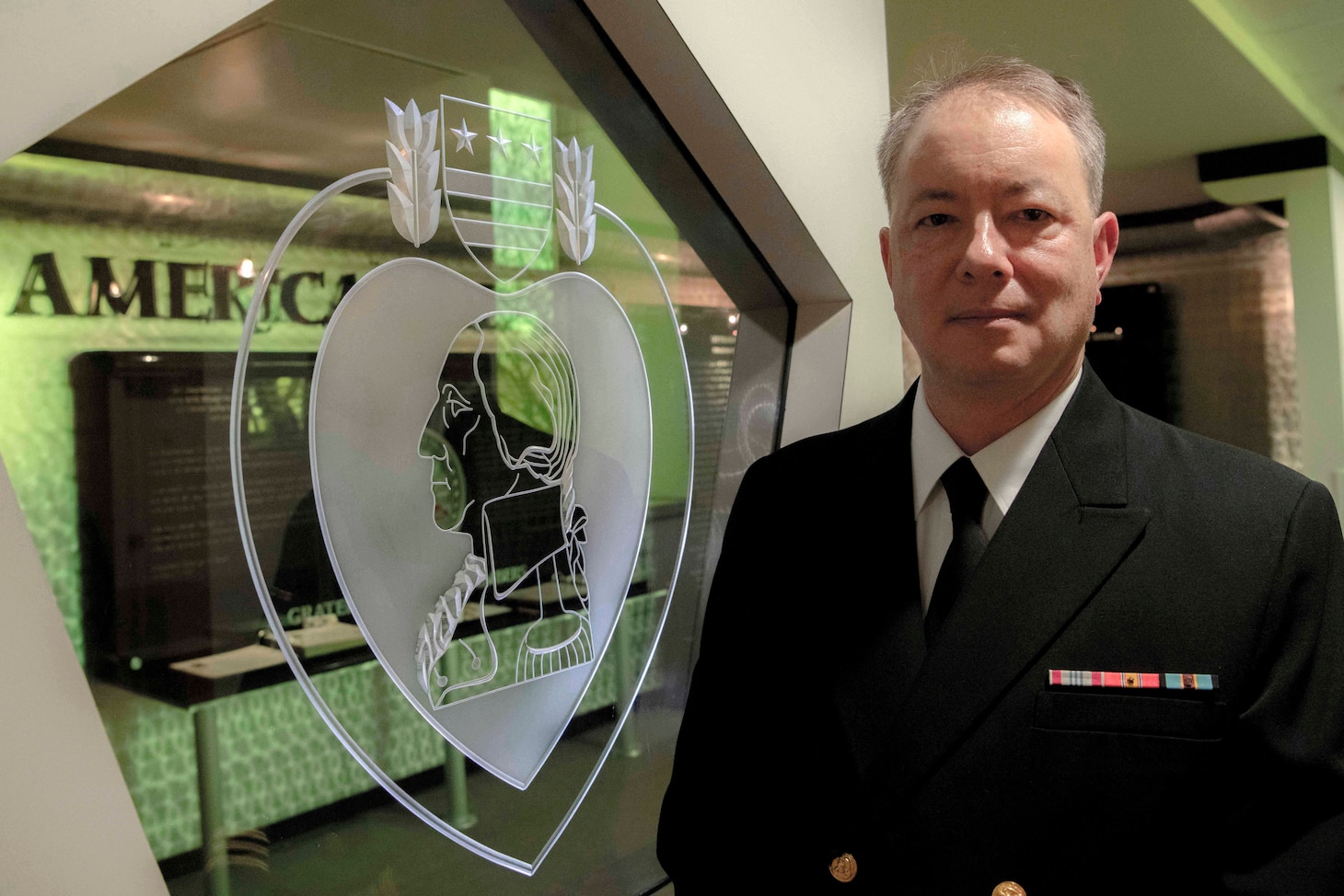 NEW YORK CITY (Jan. 26, 2024) – Cmdr. Richard King poses in front of a display at the National September 11th  Memorial and Museum. Since his departure from the Army in 2000, Commander Richard King had been committed to spending as much time with his family as he could, but he always felt a desire to care for service members like his father had. It is this level of expertise and care for his community that King hopes to bring to a new community: the Navy Reserve.

(U.S. Navy photo by Chief Mass Communication Specialist Elisandro T. Diaz)