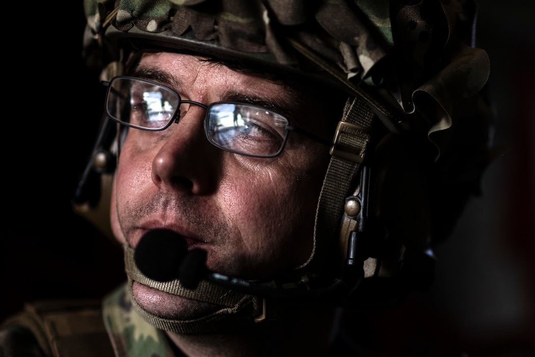 U.S. Air Force Master Sgt. David Peters, 74th Fighter Generation Squadron first sergeant and contingency location commander, watches loadmasters assigned to the 71st Rescue Squadron load an HC-130J Combat King II before departing Avon Park Air Force Range, Florida, April 10, 2024. As part of Exercise Ready Tiger 24-1, a small team consisting of various Air Force specialties forward deployed to Contingency Location Perry-Houston, Georgia, to conduct rapid refueling of A-10C Thunderbolt II aircraft. During Ready Tiger 24-1, the 23rd Wing will be evaluated on the integration of Air Force Force Generation principles such as Agile Combat Employment, integrated combat turns, forward aerial refueling points, multi-capable Airmen, and combat search and rescue capabilities. (U.S. Air Force photo by Tech. Sgt. Devin Boyer)