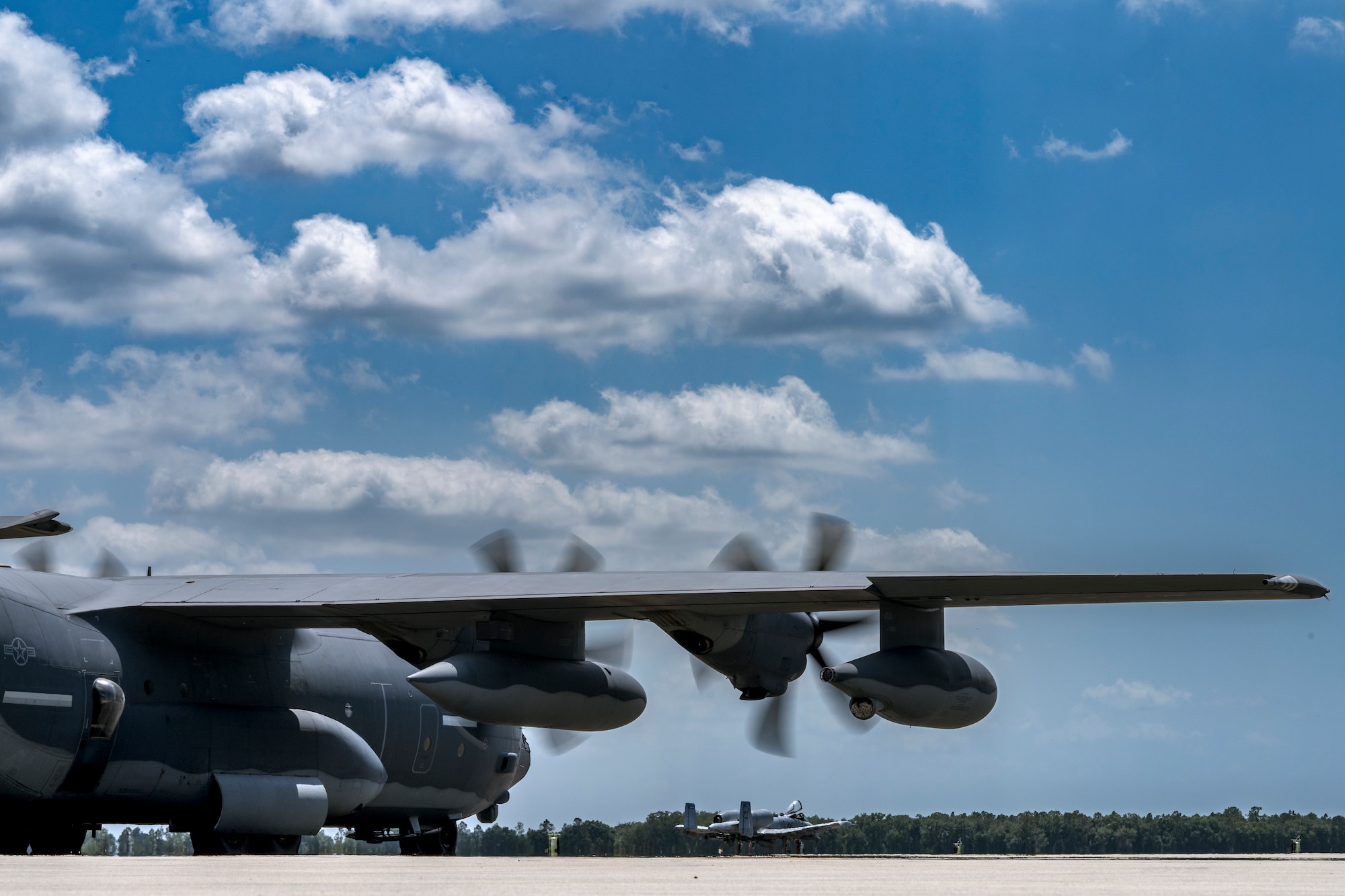 U.S. Air Force Airmen assigned to the 23rd Wing prepare to depart Avon Park Air Force Range, Florida, as part of Exercise Ready Tiger 24-1, April 10, 2024. The HC-130J Combat King II provided airlift for a small team who mobilized to Contingency Location Perry-Houston, Georgia. During Ready Tiger 24-1, the 23rd Wing will be evaluated on the integration of Air Force Force Generation principles such as Agile Combat Employment, integrated combat turns, forward aerial refueling points, multi-capable Airmen, and combat search and rescue capabilities. (U.S. Air Force photo by Tech. Sgt. Devin Boyer)