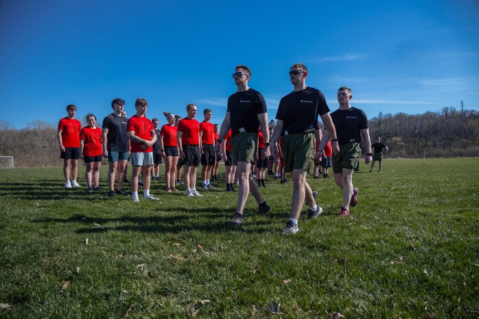 Marines with Recruiting Sub-Station Cedar Rapids and Recruiting Sub-Station Quad Cities held their monthly pool function in Iowa City, Iowa, April 13, 2024. During this training event the poolees were taught basic drill movement, conducted a motivational run, and swore their oath of enlistment during a Iowa Heartlanders hockey game. The purpose of the monthly pool function is to ensure the poolees have the opportunity to prepare mentally and physically before recruit training and to experience the camaraderie of the Marine Corps. (U.S. Marine Corps photo by Cpl. Collette Hagen)