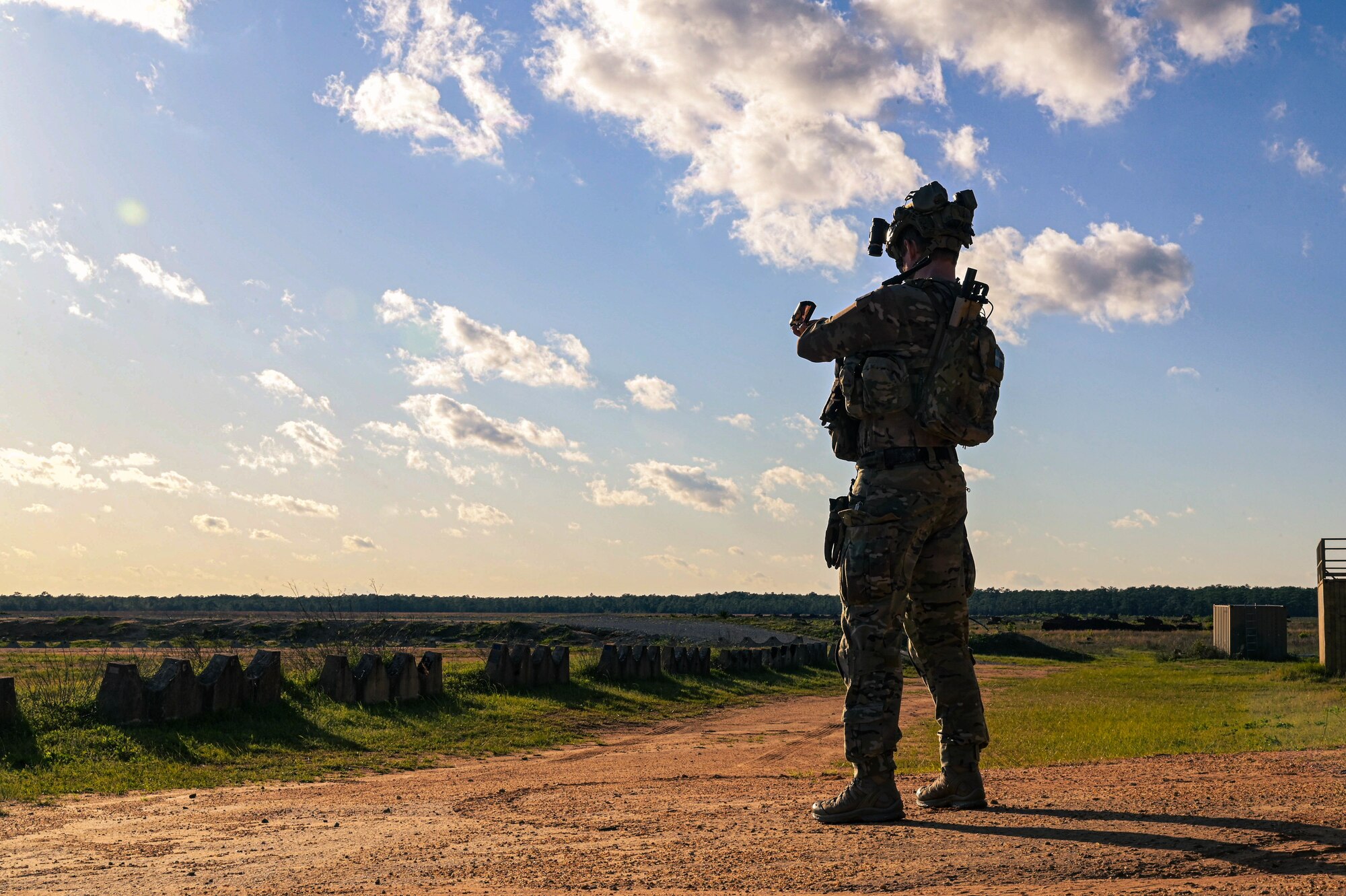 A Swedish Special Forces Command member uses a compass during Exercise Emerald Warrior Spiral at the Eglin Range, Florida, April 11, 2024.