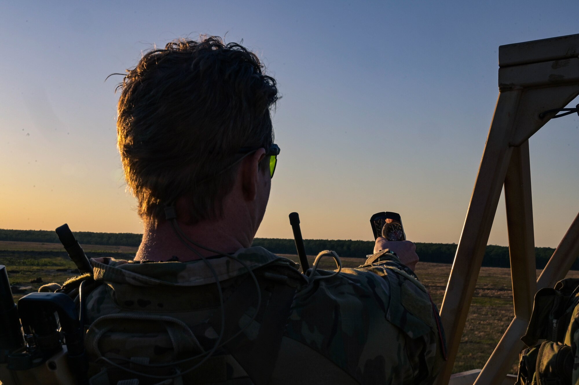 A Swedish Special Forces Command member uses a compass during Exercise Emerald Warrior Spiral at the Eglin Range, Florida, April 11, 2024.