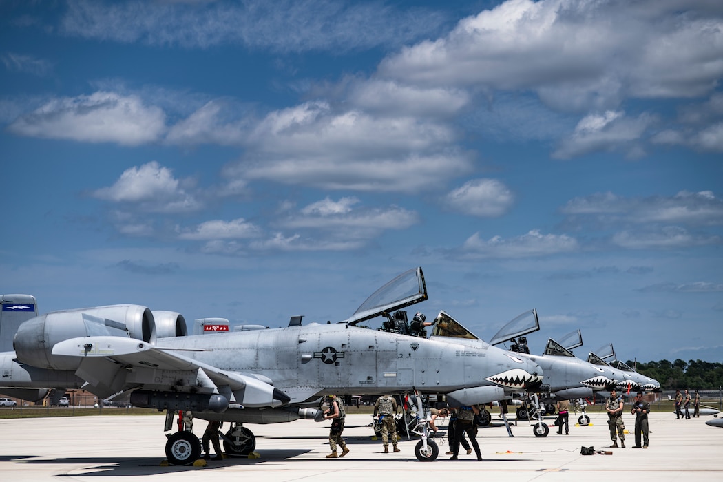 U.S. Air Force Airmen assigned to the 74th Fighter Generation Squadron conduct maintenance and prep for A-10C Thunderbolt II aircraft at Avon Park Air Force Range, Florida, April 10, 2024. The 74th FS conducted flying operations for the exercise, responding to planned scenarios in a simulated Indo-Pacific area of responsibility. During Ready Tiger 24-1, exercise inspectors will assess the 23rd Wing's proficiency in employing decentralized command and control to fulfill air tasking orders across geographically dispersed areas amid communication challenges, integrating Agile Combat Employment principles such as integrated combat turns, forward aerial refueling points, multi-capable Airmen, and combat search and rescue capabilities. (U.S. Air Force photo by Tech. Sgt. Devin Boyer)