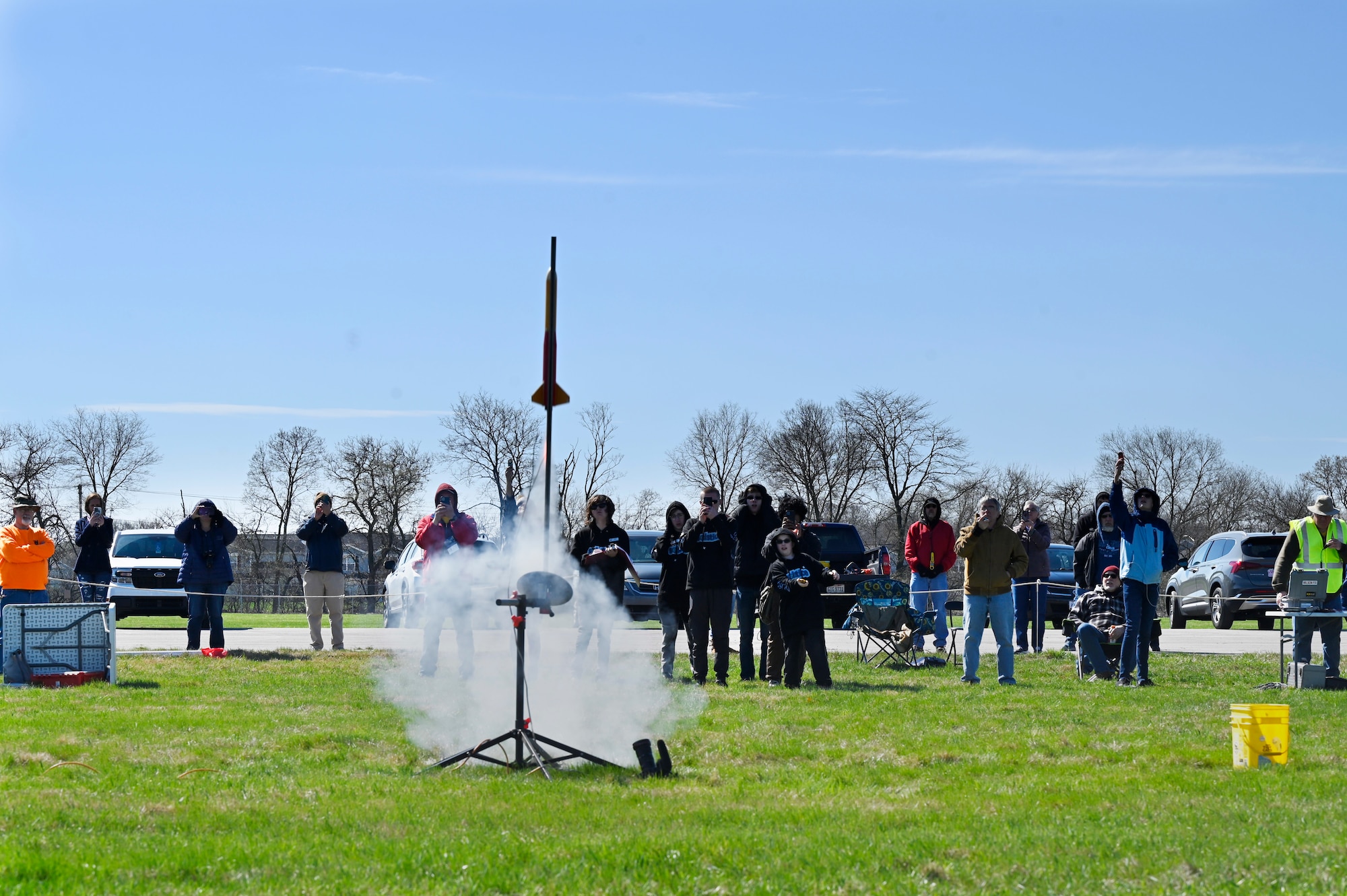 Members of the National Museum of the US Air Force ARC Rocketry Team launch rockets in preparation for the upcoming competition.