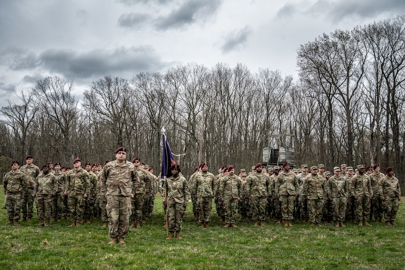 U.S. Army Soldiers stand in formation during a ribbon cutting ceremony for a new C-130 Hercules trainer at Joint Base McGuire-Dix-Lakehurst, N.J., April 13, 2024. The HERC trainer, tailored for airborne operations training, stands as a testament to meticulous preparation and adherence to established protocols for static line parachuting techniques and training. (U.S. Air Force photo by Staff Sgt. Austin Knox)