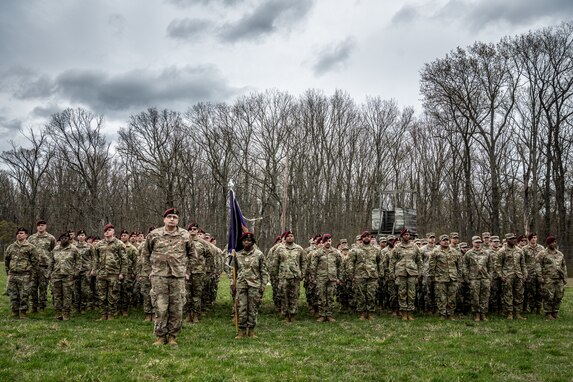 U.S. Army Soldiers stand in formation during a ribbon cutting ceremony for a new C-130 Hercules trainer at Joint Base McGuire-Dix-Lakehurst, N.J., April 13, 2024. The HERC trainer, tailored for airborne operations training, stands as a testament to meticulous preparation and adherence to established protocols for static line parachuting techniques and training. (U.S. Air Force photo by Staff Sgt. Austin Knox)