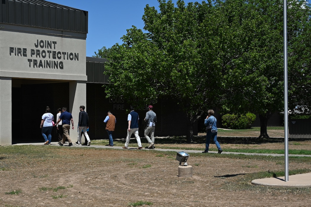 Participants with the Leadership San Angelo tour enter the Louis F. Garland Department of Defense Fire Academy at Goodfellow Air Force Base, Texas, April 11, 2024. The tour showcased Goodfellow’s mission and day-to-day activities to community leaders to build trust and understanding between the base and the city of San Angelo. (U.S. Air Force photo by Airman 1st Class Brian Lummus)