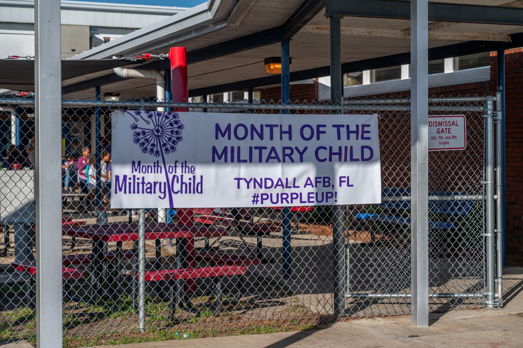 A banner on a fence