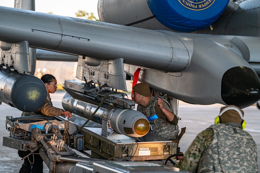 U.S. Air Force Airmen assigned to the 23rd Maintenance Group load a missile during Exercise Ready Tiger 24-1 at Avon Park Air Force Range, Florida, April 13, 2024. Small crews of Multi-Capable Airmen were deployed to a simulated contingency location to practice Agile Combat Employment concepts. Ready Tiger 24-1 is a readiness exercise demonstrating the 23rd Wing’s ability to plan, prepare and execute operations and maintenance to project air power in contested and dispersed locations, defending the United States’ interests and allies. (U.S. Air Force photo by Airman 1st Class Leonid Soubbotine)