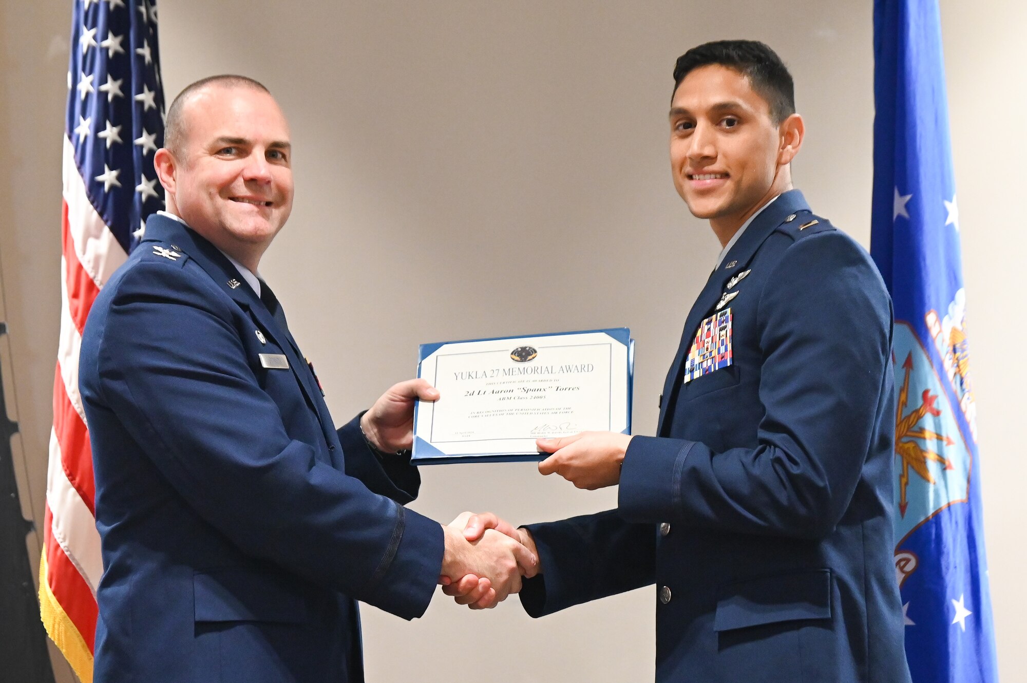A photo of Airmen posing.