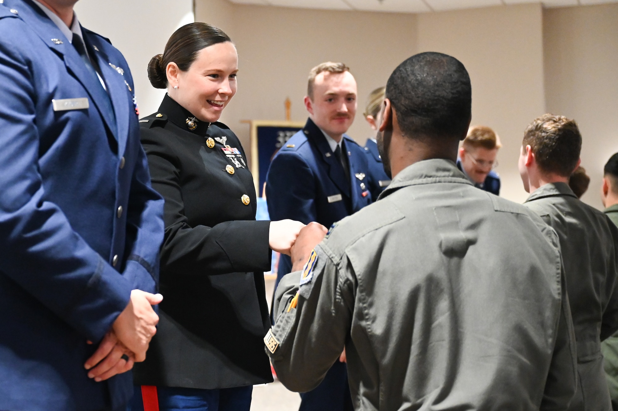 A photo of a group of Airmen and Marines.