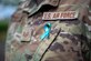 U.S. Air Force Tech. Sgt. Kyle Mergeler, 142nd Wing religious affairs, wears a teal ribbon during 