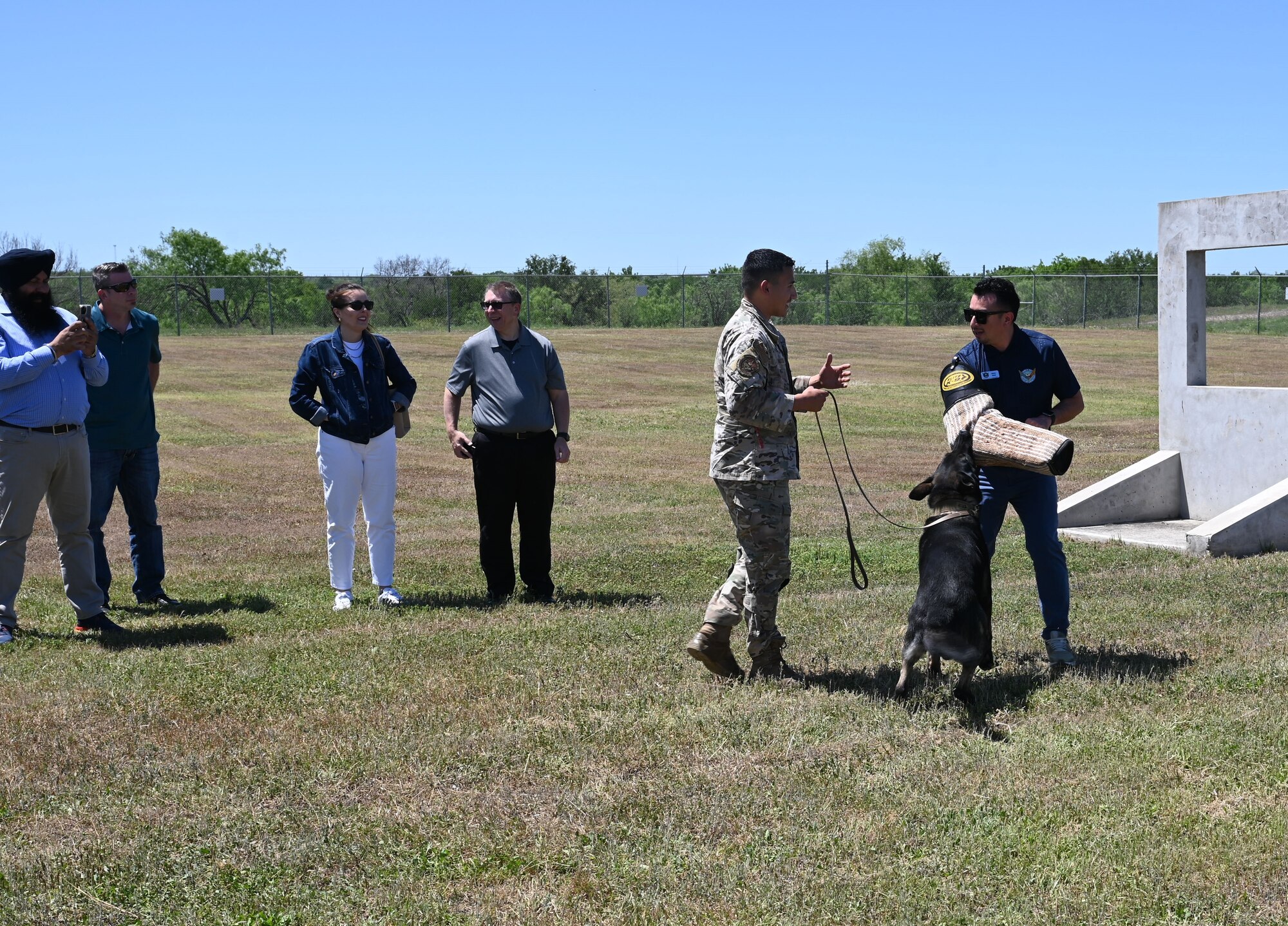 A dog handler shows council dog handler training.