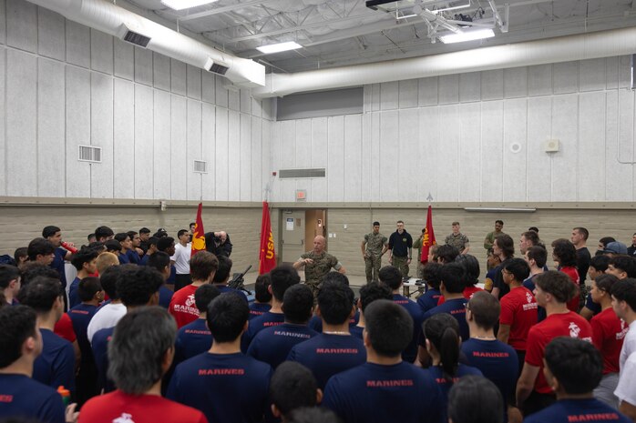 U.S. Marine Corps 1st Sgt. Daniel Poldoski, a first sergeant with Combat Logistics Battalion 23, speaks to poolees with Recruiting Sub-Stations Manteca, Merced, Modesto and Stockton, Recruiting Station Sacramento, at Defense Depot San Joaquin Sharpe in Lathrop, Calif., April 13. The event was held to build esprit de corps and morale amongst the poolees. (U.S. Marine Corps photo by Sgt. Ryan Harvey)