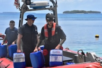 The crew of USCGC Oliver Henry (WPC 1140) delivers drought relief supplies, reverse osmosis systems, and technicians to Woleai, Yap State, Federated States of Micronesia, on April 12, 2024, in support of a request from the U.S. Embassy, in partnership with USAID and the International Organization for Migration (IOM). The support provided to the four outer island communities of Satawal, Woleai, Fais, and Ulithi highlights the U.S. role in providing essential aid and strengthening community resilience against natural disasters to the residents of FSM. (U.S. Coast Guard photo)