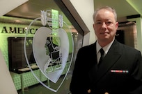 NEW YORK CITY (Jan. 26, 2024) – Cmdr. Richard King poses in front of a display at the National September 11th  Memorial and Museum. Since his departure from the Army in 2000, Commander Richard King had been committed to spending as much time with his family as he could, but he always felt a desire to care for service members like his father had. It is this level of expertise and care for his community that King hopes to bring to a new community: the Navy Reserve.

(U.S. Navy photo by Chief Mass Communication Specialist Elisandro T. Diaz)
