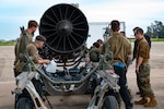 Maintenance Airmen assigned to the 9th Expeditionary Bomb Squadron from Dyess Air Force Base, Texas, complete an engine swap on a B-1B Lancer at Morón Air Base, Spain, April 3, 2024, during Bomber Task Force Europe. The ability to perform heavy maintenance in a deployed environment demonstrates crews can maintain a high state of readiness and proficiency. (U.S. Air Force photo by Airman 1st Class Emma Anderson)